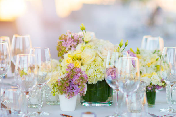 istock rose bouquet in vase on decorated table - wedding, party 645720744