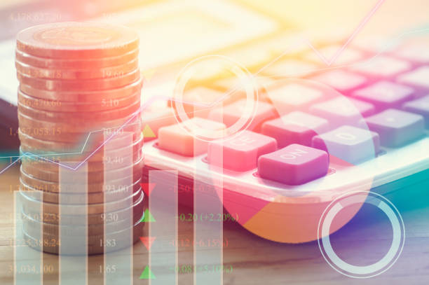 istock graph on rows of coins for stock market 645728172