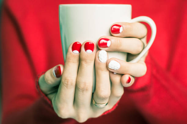 istock Woman holding a cup with tea 645744922