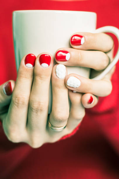 istock Woman holding a cup with tea 645744992