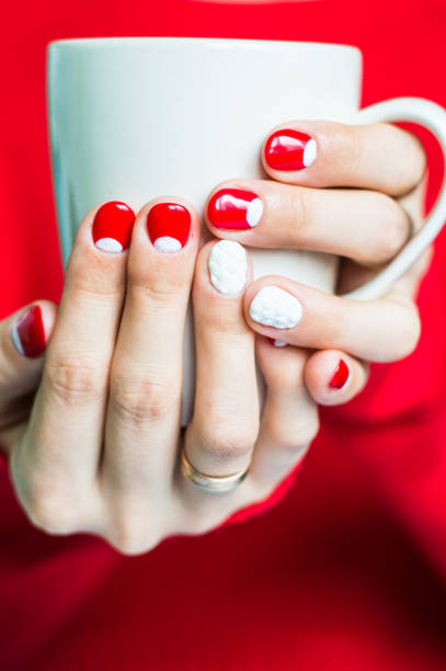 istock Woman holding a cup with tea 645745088