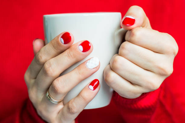 istock Woman holding a cup with tea 645745156