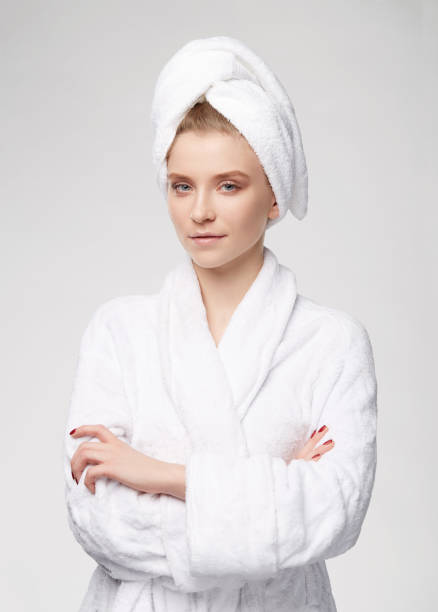 istock Woman at the spa gray background white 645746022