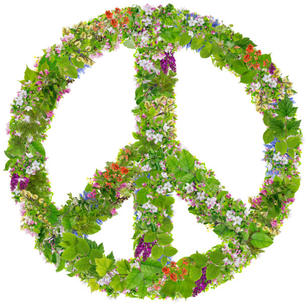 istock Green Peace symbol abstract collage made from fresh spring branches plants  and  flowers. Isolated 645748978
