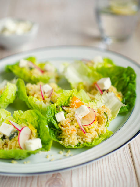 istock Couscous salad in baby gem 645749702