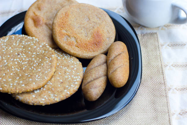istock Beautiful homemade bread on black plate 645761496
