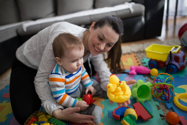 istock Mother playing with baby boy 645771392