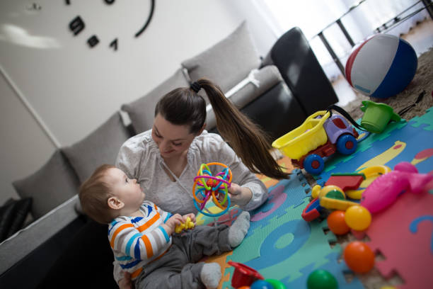 istock Mother playing with baby boy 645771414