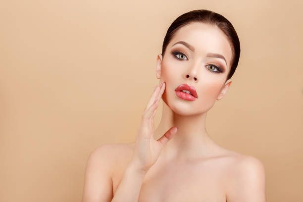 istock Beautiful Woman with Clean Fresh Skin 645776730