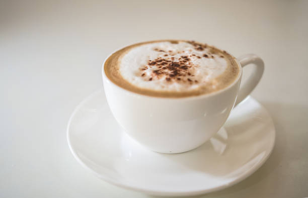 istock Barista making a cup of coffee soft focus image . 645777948