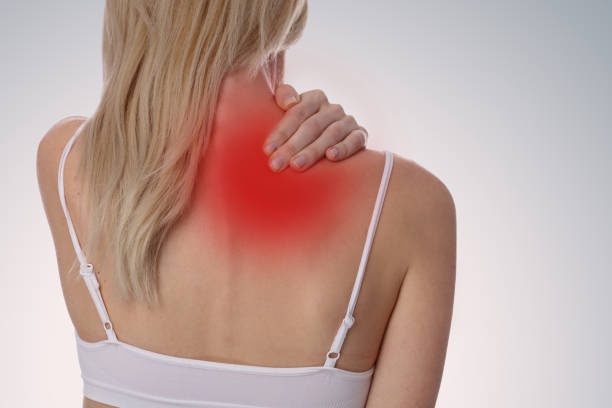 istock Woman suffering from back and neck pain 645788342