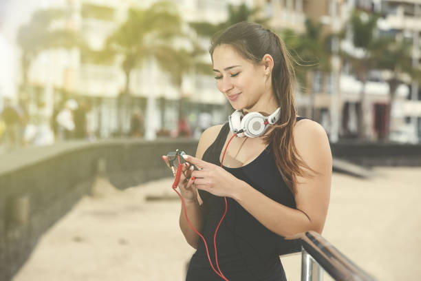 istock Woman changing song 645794318
