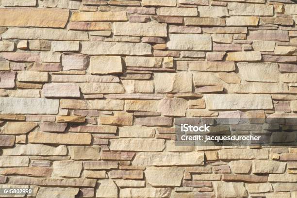 Beige Stone Wall Bricks Surface Texture Pattern Stock Photo - Download Image Now - Architecture, Backgrounds, Beige
