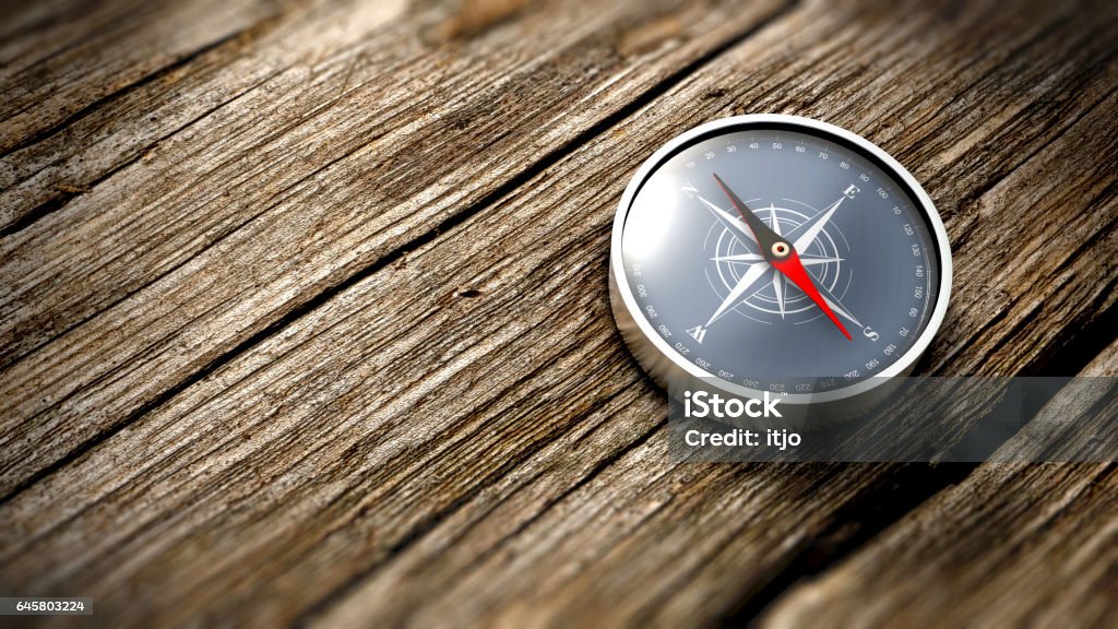 Kompass zeigt Norden auf einem Holztisch hautnah. 3D Rendering - Lizenzfrei Karte - Navigationsinstrument Stock-Foto