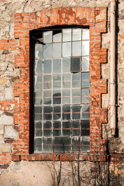istock Window of old industrial building 645810918