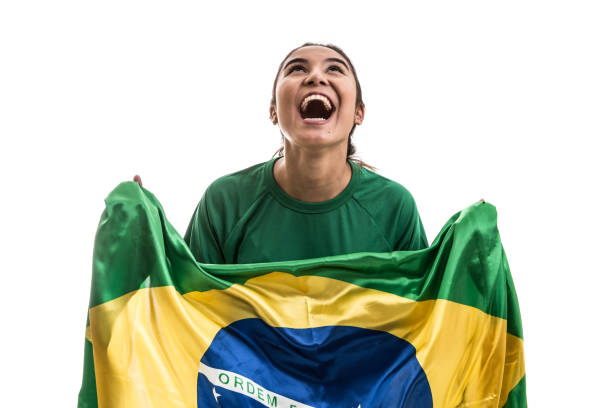 istock Brazilian fan celebrating on white background 645813852