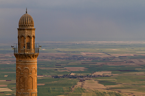 Minaret of Ulu Mosque in Mardin and mesopotamian plain.