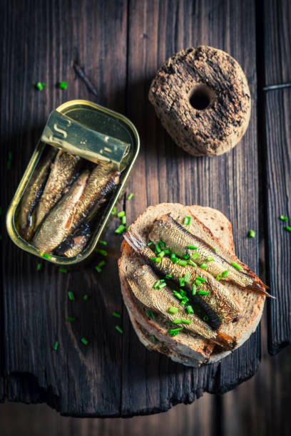 istock Tasty sandwich wirh sardines with and chive 645821402
