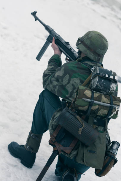 istock Soldier aiming at target at firing field 645833894