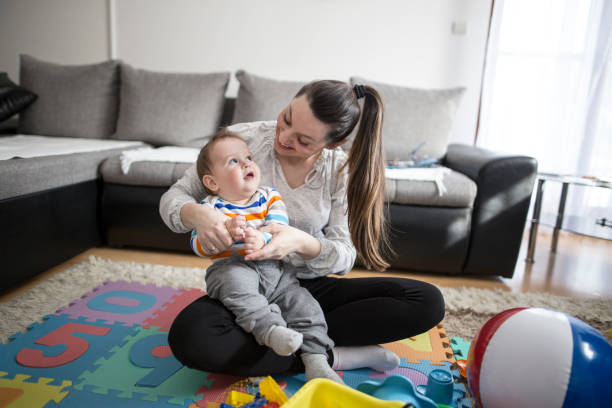 istock Mother playing with her son 645834386