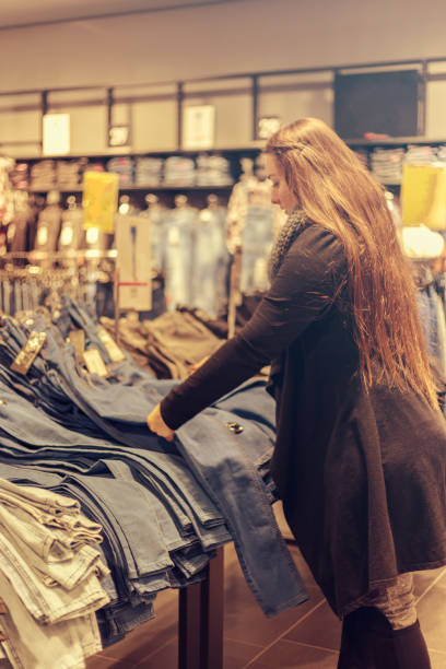 istock Young woman shopping 645838362