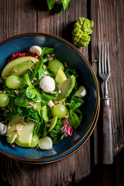 istock Spring kale salad with avocado, lettuce and grape 645845420