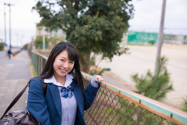 istock High school girl going back home after school 645847780