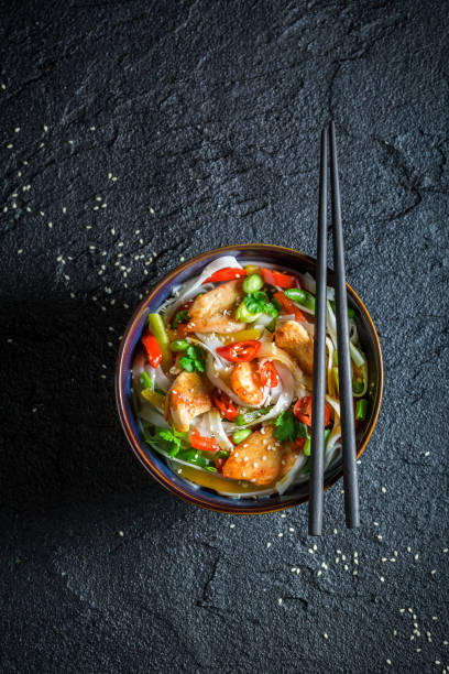 istock Enjoy your noodle with vegetables, chicken and chili peppers 645858566