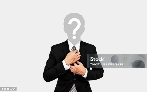 Businessman With Question Mark On Head On Soft Grey Background Stock Photo - Download Image Now