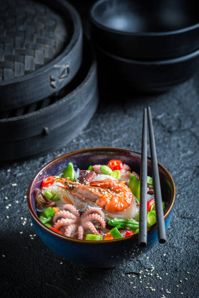 istock Enjoy your seafood noodle with prawn and octopus 645861594