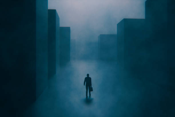 Foggy empty street at night