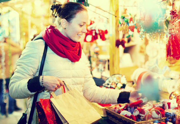 istock Female customer at the Christmas Fair 645878178
