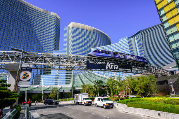 Las Vegas, USA - February 24, 2017 : Las Vegas Aria Resort Hotel looking from the entrance with monorail. Aria Hotel is one of the most luxury hotel in Las Vegas area. Monorail in front connects with neighbouring area hotels and offer free ride.