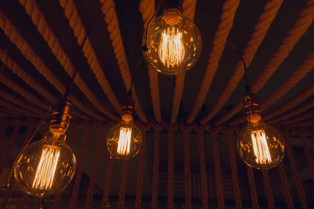 istock Incandescent lamps  in a modern cafe. Lighting decor 645888914