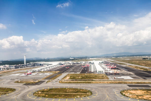 An aerial view of the KLIA 2 airport in Malaysia Kuala Lumpur, Malaysia - January 17, 2017: An aerial view of the KLIA 2 airport, which is the hub of the low coast airline AirAsia in Malaysia. kuala lumpur airport stock pictures, royalty-free photos & images