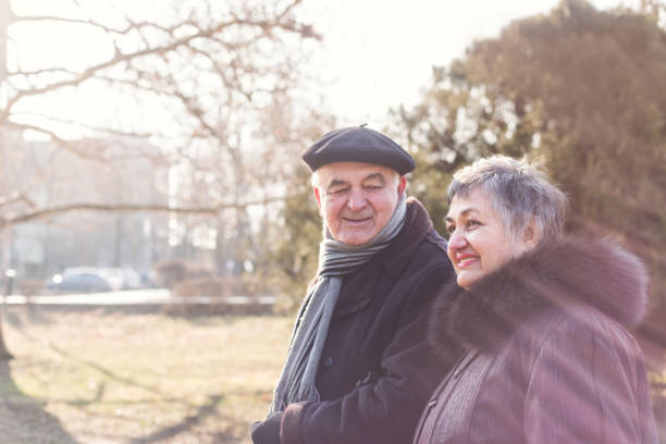 istock senior couple walking 645894150