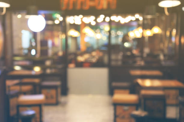 istock Blurred image of cafe or restaurant with bokeh lights background 645896560