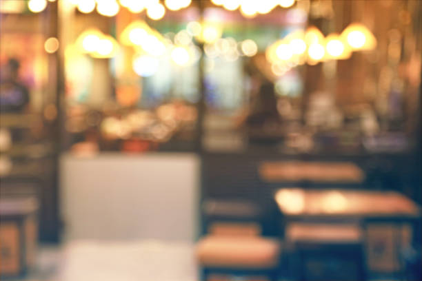 istock Blurred image of cafe or restaurant with bokeh lights background 645896594