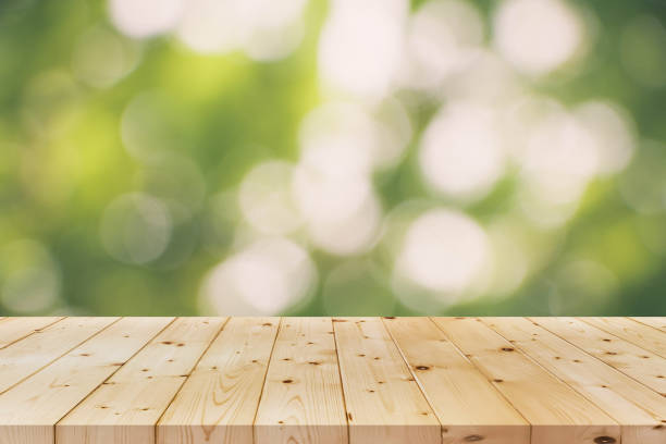 istock bokeh colorful and wood floor 645903146