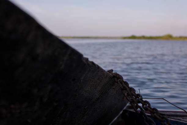 Wood boat moored on the river.