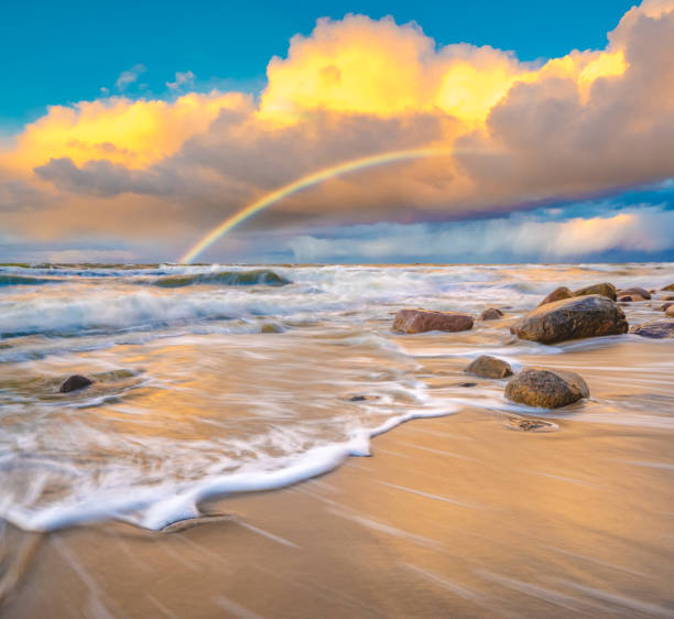 istock beautiful colored storm clouds over the sea beach 645926370