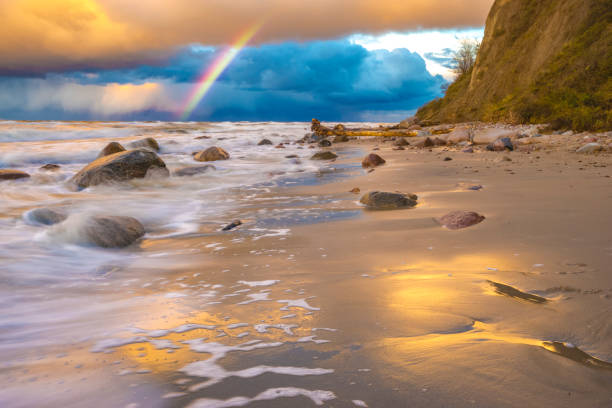 istock beautiful colored storm clouds over the sea beach 645926396