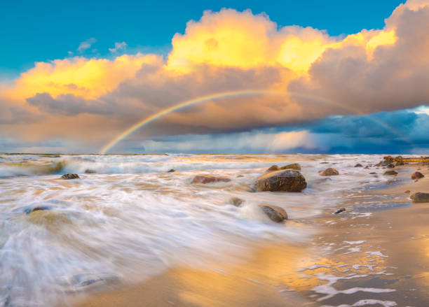 istock beautiful colored storm clouds over the sea beach 645926398