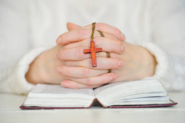 istock Close-Up Of Clasped Hands. 645926980