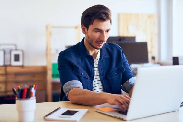 istock Young men doing online business working as freelancer 645929614