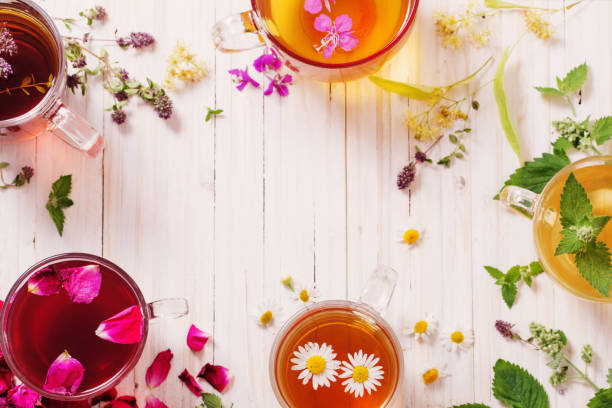 istock herbal tea on a white wooden background 645945280