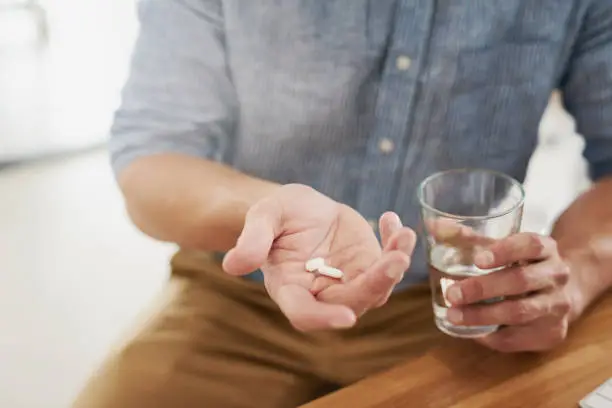 Photo of Taking his prescribed treatment