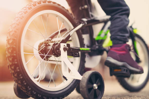 istock Close-up children's feet on the bicycle 645947666