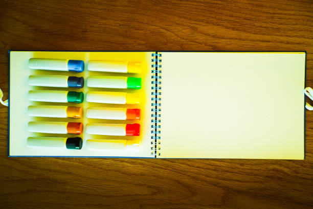 istock On the sketchbook, Colorful  paints in tubes 645948186