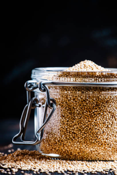 istock Raw Quinoa barley in a glass jar 645949464